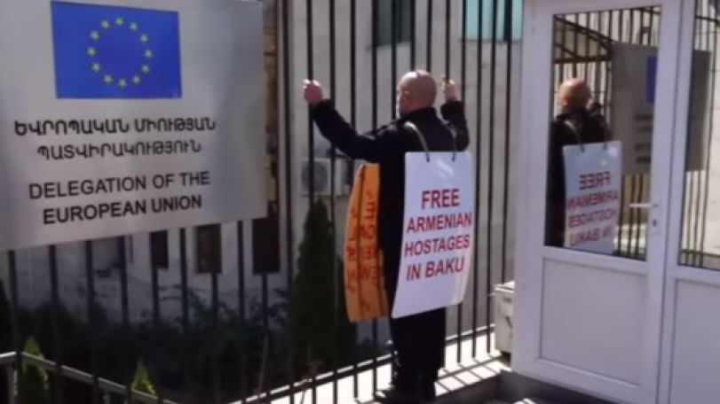 Armen Ashotyan holds solo protest outside EU office in Armenia