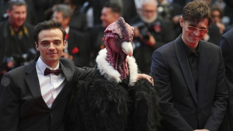 Bird man walks Cannes red carpet