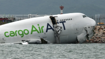 Two killed after cargo plane skids off Hong Kong runway into sea