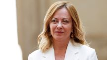 Italian PM Giorgia Meloni rolls her eyes as Macron whispers to her at G7 roundtable