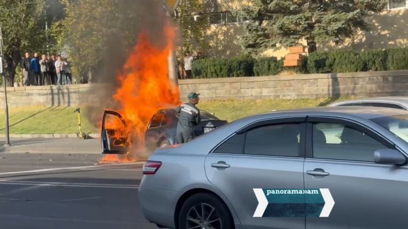 Car catches fire near Yerevan district administration building