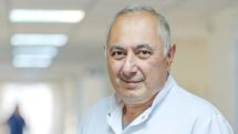 Law enforcement officers search Armen Charchyan’s office