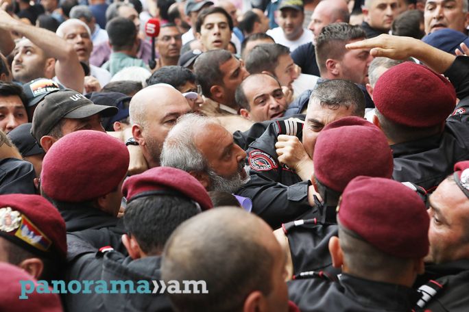 Police officers kicked Archbishop Bagrat, beat deacons, MP says