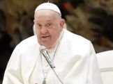 Pope Francis had peaceful night after breathing crisis, Vatican says
