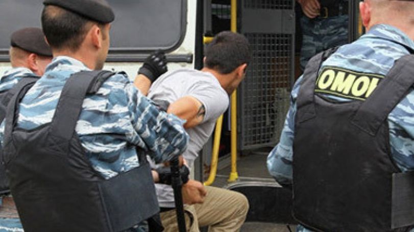 Hundreds held in police raid on market in southeast Moscow