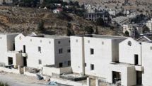 Kerry hopeful on Mid-East talks despite settlement move