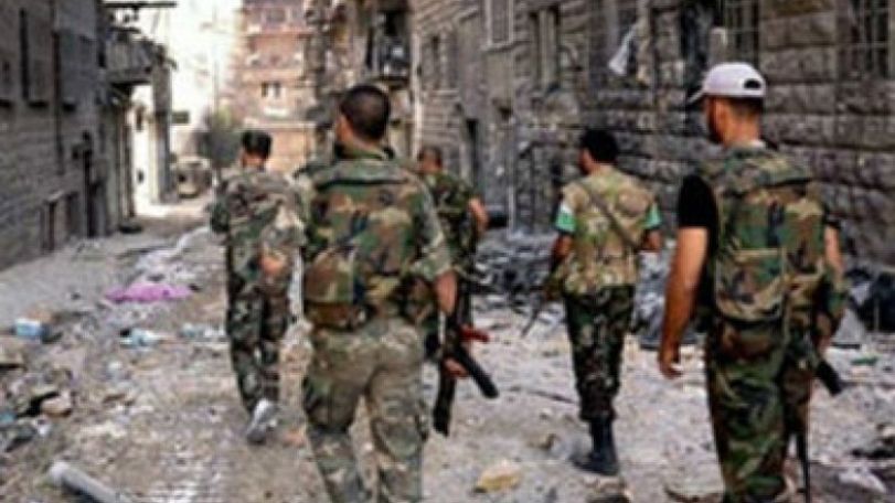 Fierce battle for key Syrian town