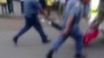South Africa police trial over dragging death