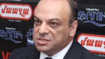 Presidential candidate Arman Melikyan prepared to congratulate winner 