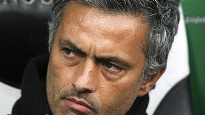 Mourinho kicks fan in rear end