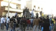 Syrian forces pound Damascus suburbs, flights to resume
