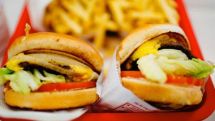 You CAN eat fast food after exercise: Burgers and chips are just as good as supplements for workout recovery