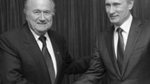 Russian PM Vladimir Putin congratulates FIFA head Sepp Blatter
