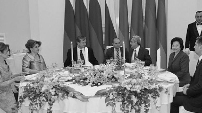 "Presidents Sargsyan and Turk meet in a business meeting to talk about further cooperation, historical similarities, etc."