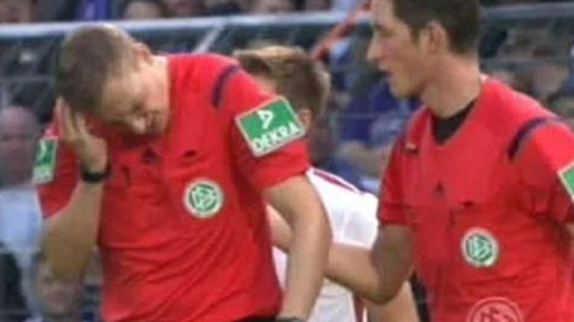German Cup match suspended after referee hit in head