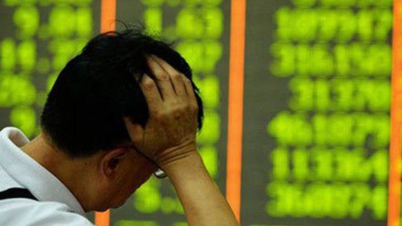 Chinese shares slide in another day of volatile trade