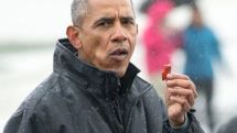 President Obama eats salmon previously chewed on by a bear