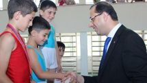 Winners of gymnastics competition presented with medals 
