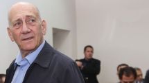 Ehud Olmert 'satisfied' after bribery prison sentence reduced to 18 months