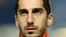 Mkhitaryan scores one goal as Borussia Dortmund reaches German Cup semi-finals in game featured by shower of tennis balls