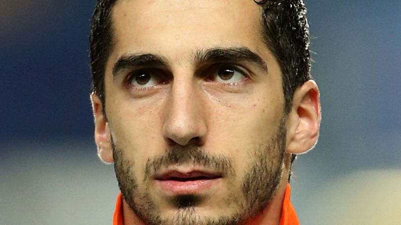 Mkhitaryan scores one goal as Borussia Dortmund reaches German Cup semi-finals in game featured by shower of tennis balls