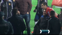 Mkhitaryan presents his shirt to a fan in wheelchair