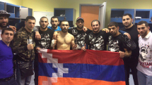Vartan Asatryan scores TKO win over Azeri opponent, waves Karabakh flag