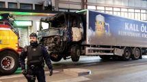 Stockholm attack: Police arrest two after lorry ploughs into shop