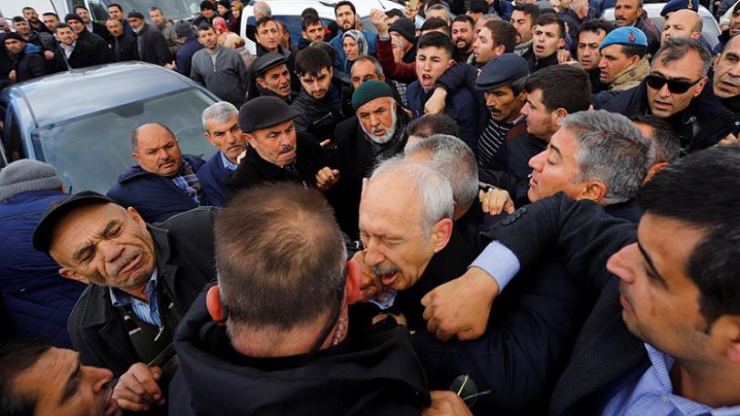 Protesters punch Turkish opposition leader at funeral