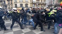 Agitators, tear gas cloud May Day march in Paris