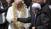 Pope Francis prays at Mother Teresa's memorial