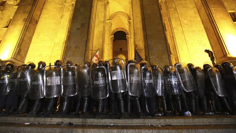 Riot police drive protesters away from Georgian parliament