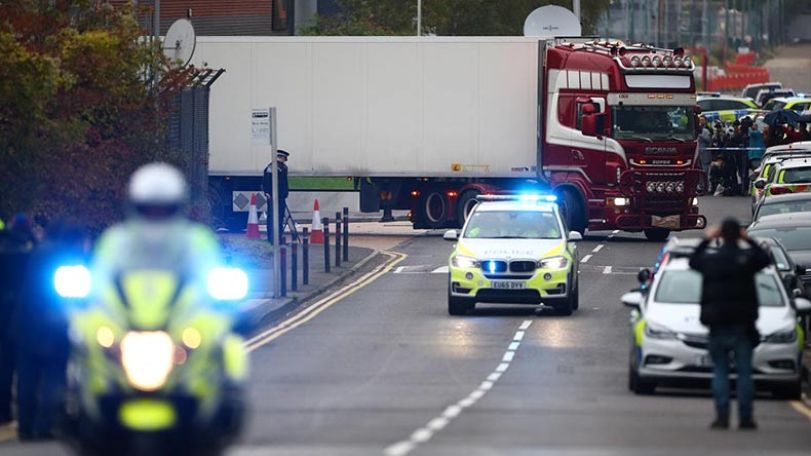 UK police investigating 39 lorry deaths raid two addresses