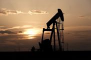 Oil rises, supported by trade deal, OPEC cuts