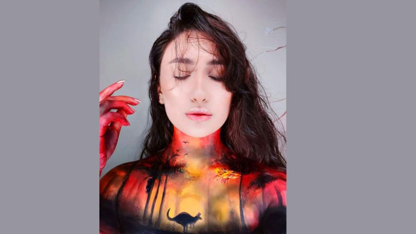 Australian fires painted on body of an Armenian painter