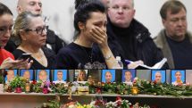 Ukrainian plane crash victims' relatives demand answers