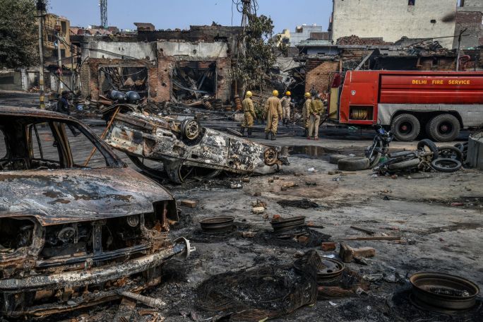 Clashes in India's capital leave more than 30 dead