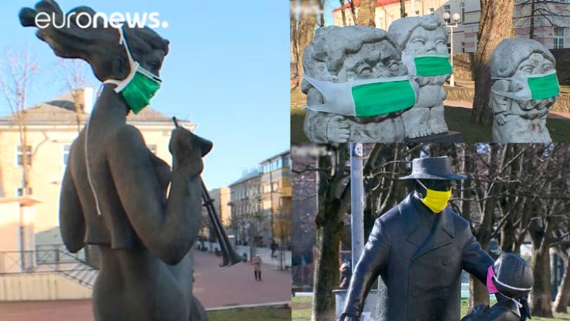 Masked statues comment on culture and health in Lithuania
