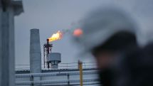 Oil jumps after OPEC and allies agree to historic production cut