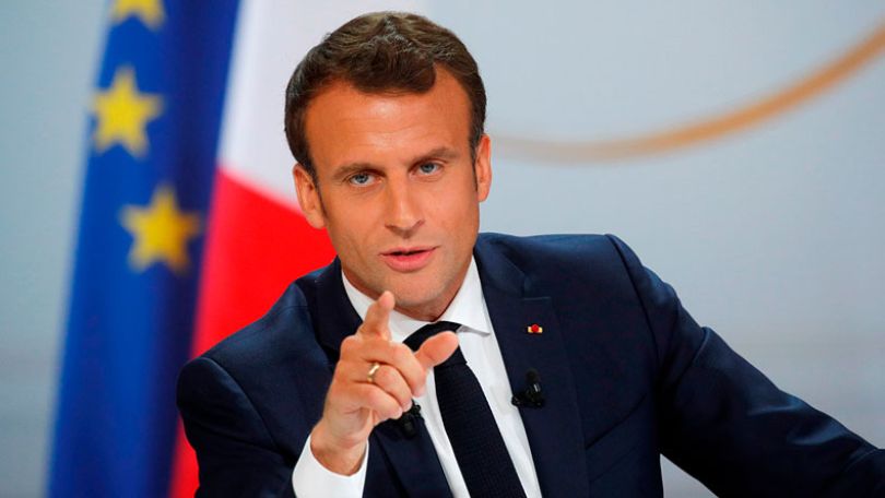 Macron hails 'first victory' against COVID-19 and reopens French borders
