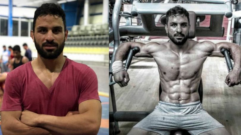 Iran imposes double execution on champion wrestler for protesting regime