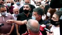 Two groups of people protest outside Armenian government