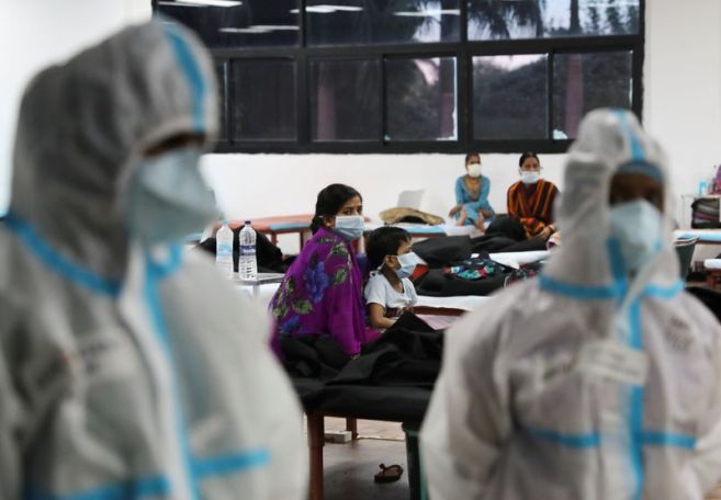 India's coronavirus infections surge again after dip