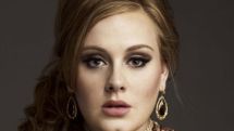 Singer Adele wins damages over paparazzi photos of son