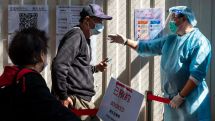 China to distribute COVID-19 vaccines free of charge