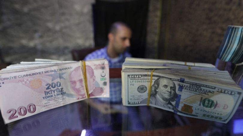 Turkish lira strengthens past 7 per dollar to six-month high