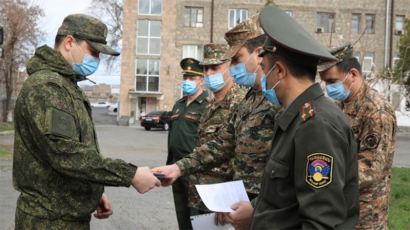 Russian specialists awarded for effective cooperation preventing the spread of coronavirus in the Armed Forces