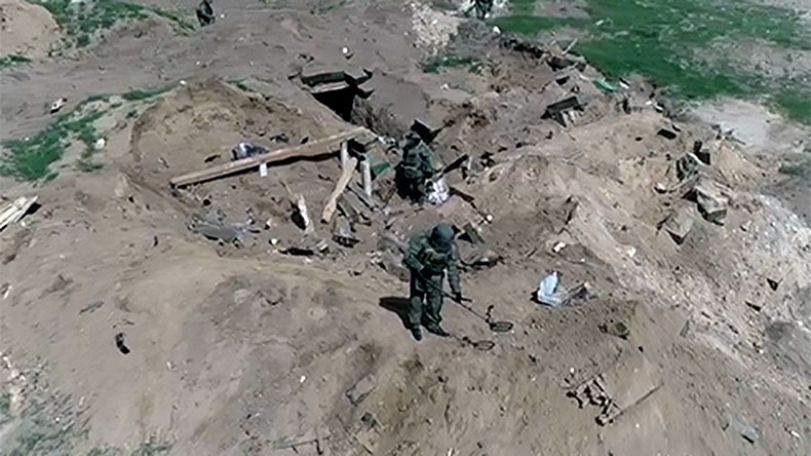 Russian sappers demine farmland on the outskirts of Mardakert city in Artsakh