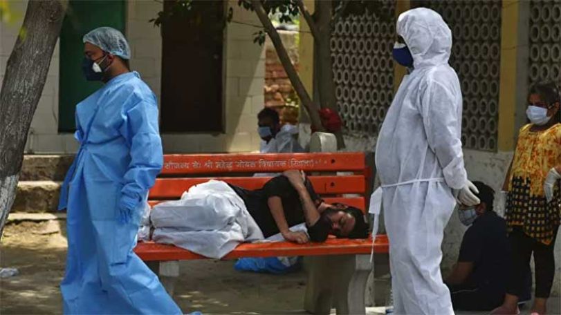 India's daily coronavirus cases rise by record 414,188