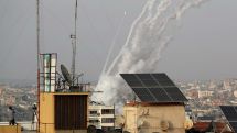 More than 20 killed in Gaza Strip air strikes after Hamas fires rockets towards Jerusalem